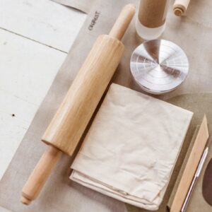 A table topped with lots of craft supplies