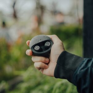 black wireless earbuds in box